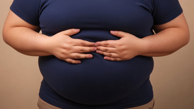 Stomach cramps, hands and man on isolated background. home with menstruation, periods or constipation. Tummy pain., photo