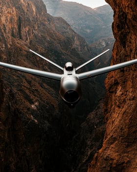 Drone flying through a narrow mountain canyon photo