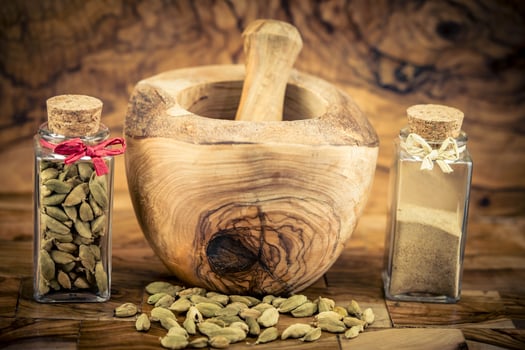 bottle with green cardamom Elettaria cardamomum photo