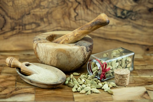 cardamom Elettaria cardamomum on olivewood photo