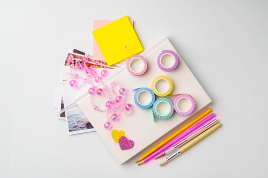 Craft supplies arranged on a clean surface ready for creative projects and scrapbooking photo