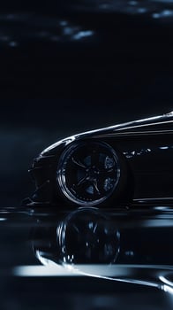Black Car Wheel and Fender Reflection photo