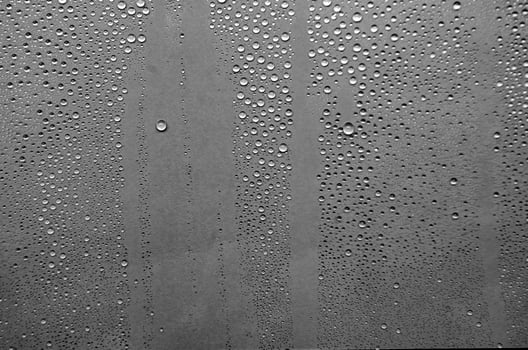 Clear water droplets with black background. Suitable for wallpaper cover design photo