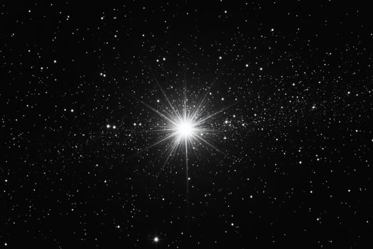A bright star in the night sky photo
