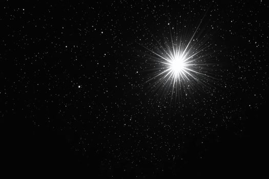 A black and white photo of a star