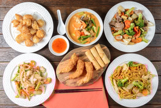 A table with several plates of food on it photo