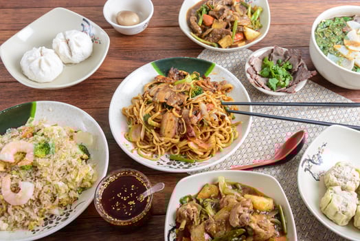 A table with many dishes of food photo