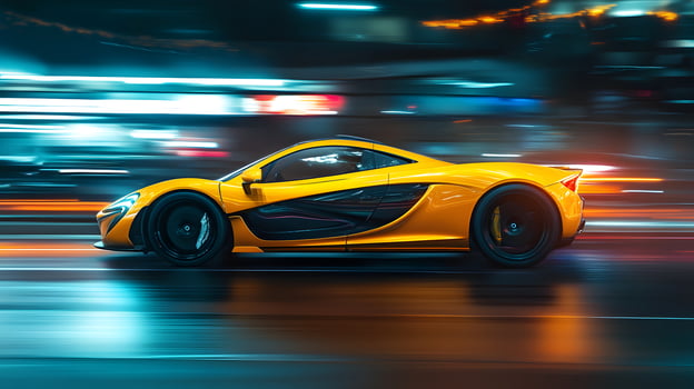 Yellow McLaren Sports Car in Motion at Night photo