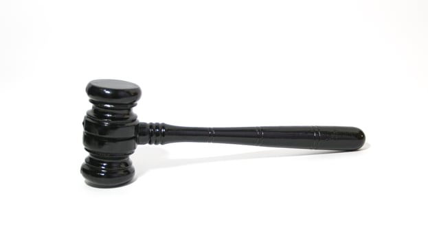 Wooden gavel isolated on white, Small mallet. photo