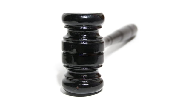 Gavel and legal wooden hammer the symbol of law and lawyer photo