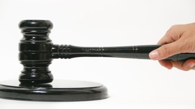 Gavel and legal wooden hammer the symbol of law and lawyer isolate background. photo