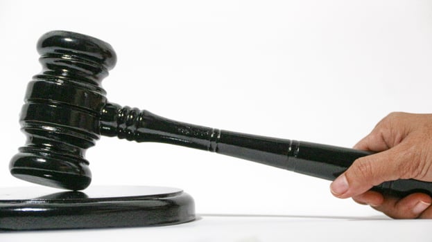 Wooden gavel isolated on white. Small mallet. Gavel and legal wooden hammer the symbol of law and lawyer isolate background. photo