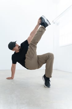 An Exceptional Dynamic Breakdancer Captured in a Powerful Pose, Highlighting Artistry and Elegance photo