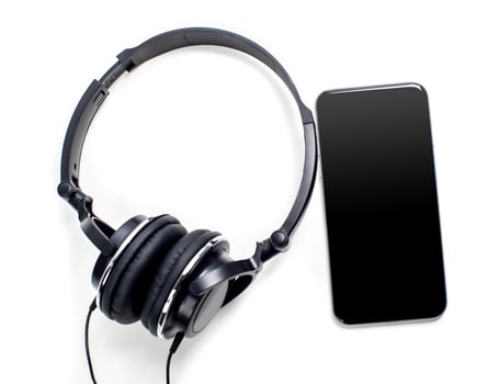 audio player with headphones isolated on white background photo