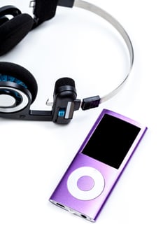 audio player with headphones isolated on white background photo