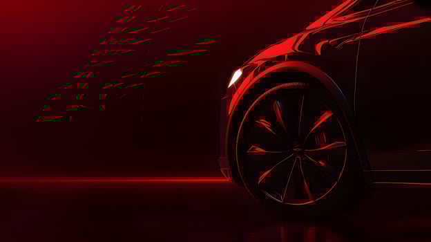 Black Vehicle with Red Illumination Wheel and Side Profile photo