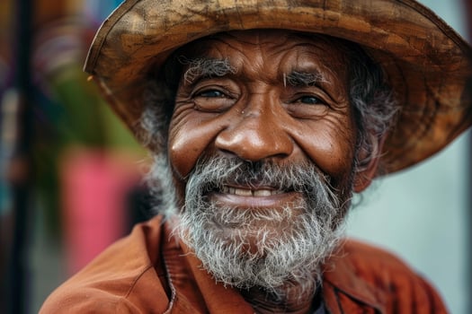 Portrait of smiling senior farmer wearing straw hat in cuba shows happiness and resilience photo