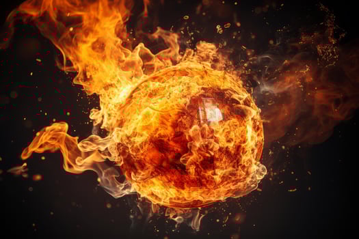 Burning basketball ball on fire with flames and smoke photo