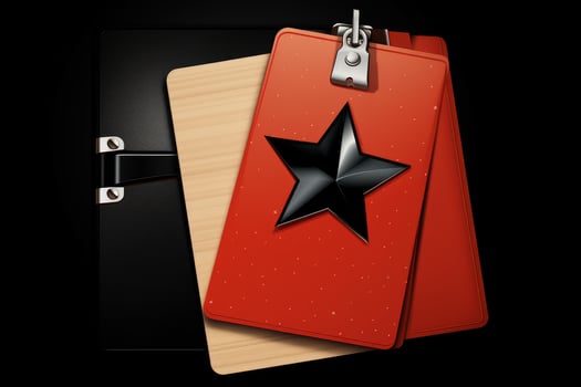 Black star shining on red labels hanging from clipboard on black background photo