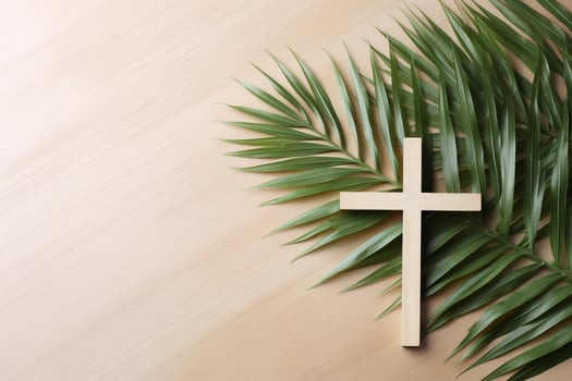 Christian cross resting on palm leaves symbolizing faith and spirituality photo