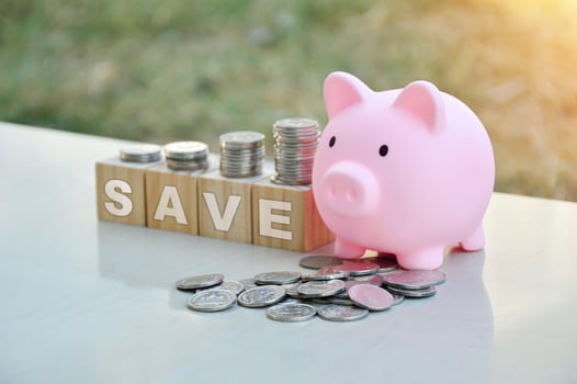 Piggy bank and coins saving and investment photo
