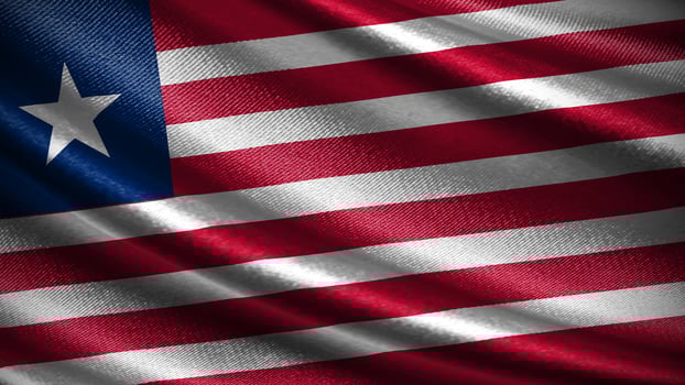 Liberia flag with realistic silky wave texture photo