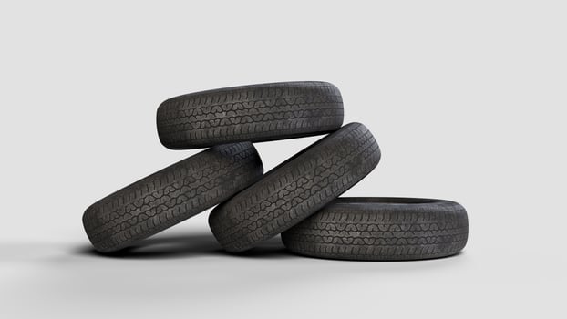 four old tires on white background, front view photo