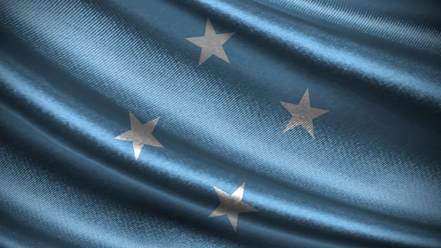 Micronesia flag with realistic silky wave texture photo