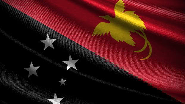 Papua New Guinea flag with realistic silky wave texture photo
