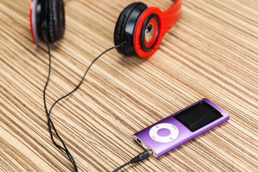 headphones on wooden background photo