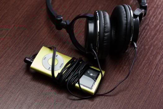 headphones on wooden background photo