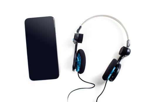 audio player with headphones isolated on white background photo