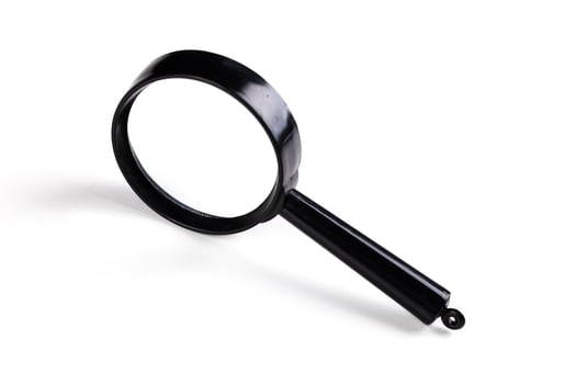 Magnifying glass isolated on white background photo