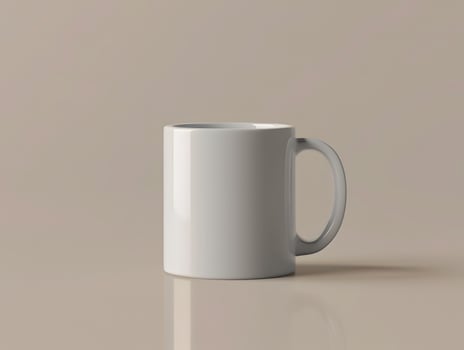 A white mug is sitting on a table photo