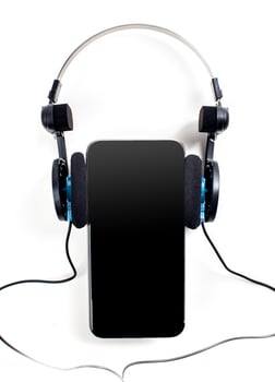 audio player with headphones isolated on white background photo