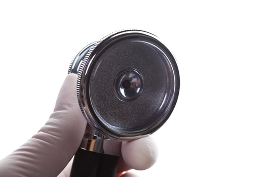 Medical stethoscope in hand photo