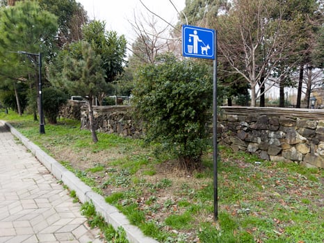 Caring sign for cleanliness of streets from animal poop photo