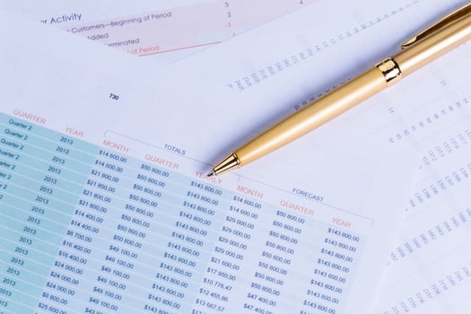 Business performance graph with ballpoint pen photo