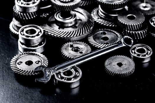 Metal gears on black background photo
