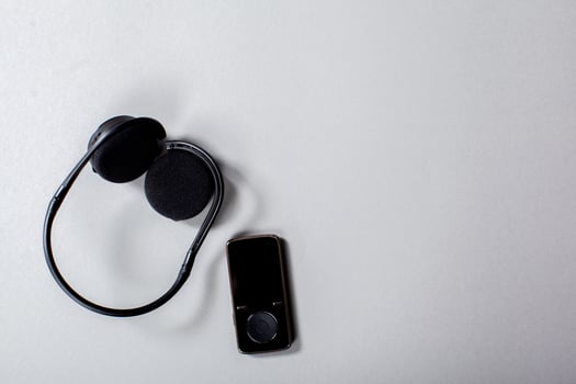 Audio Headphones with Cord on Grey Background photo