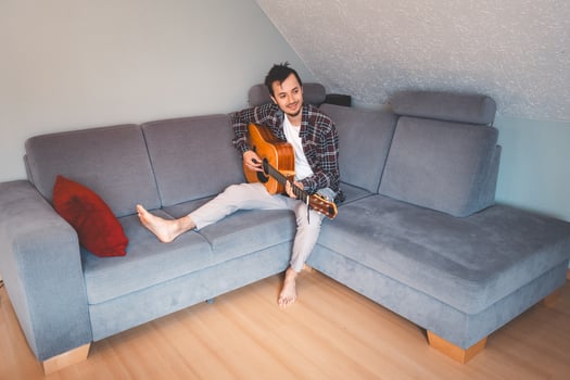 Creative time alone with an acoustic guitar photo