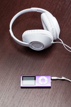 headphones on wooden background photo