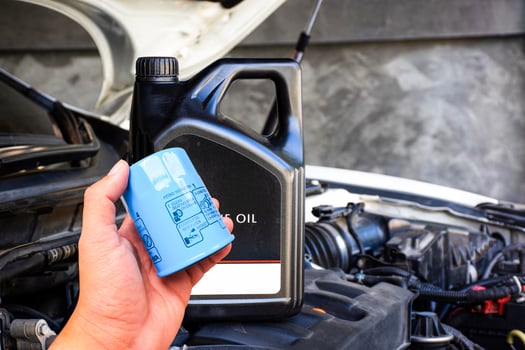 Car maintenance with engine oil and oil filter change by car owner or auto mechanic , Car maintenance concept photo