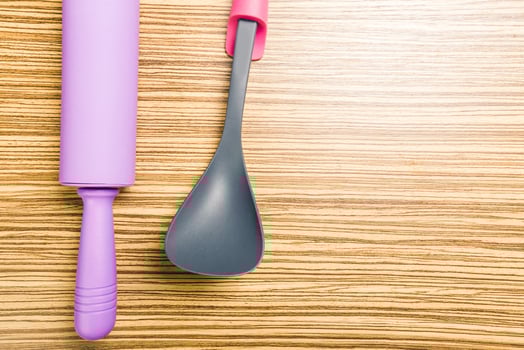 kitchenware on wooden background photo