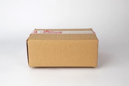 Brown cardboard box isolated on white background photo