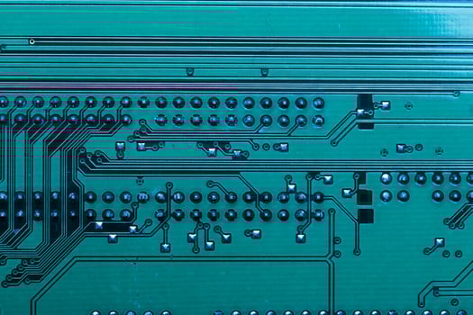 Close up of a printed green computer circuit board photo