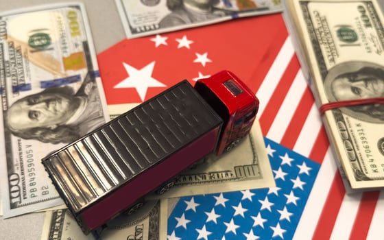 USA and China flag on coins stacking, Concept of Recession conflict tax business finance money, Symbol of economic tariffs trade war and tax barrier between United States of America and China. photo