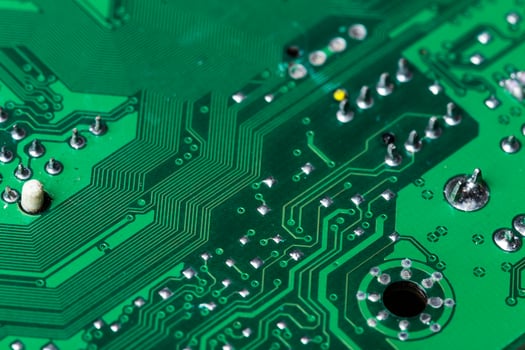Close up of a printed green computer circuit board photo