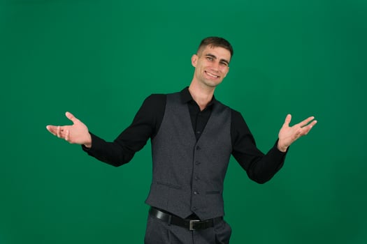 Photo of amazing guy indicating fingers up to empty space advising cool low shopping prices wear casual denim shirt isolated green color background