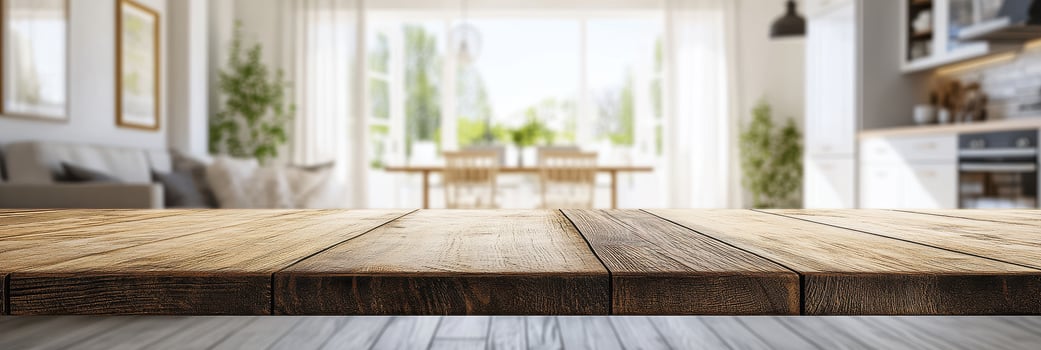 Rustic wooden table surface with blurred bright kitchen background view photo